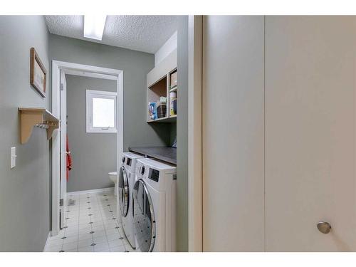 123 Ranchridge Bay Nw, Calgary, AB - Indoor Photo Showing Laundry Room