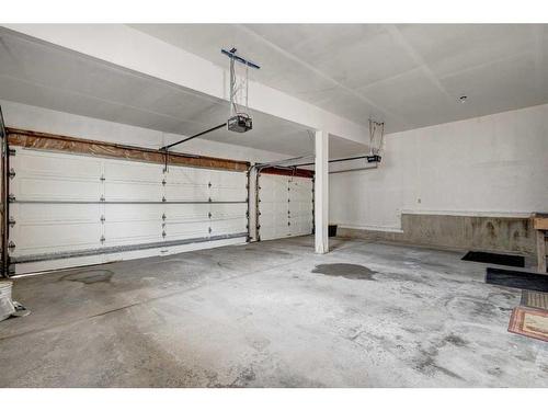 117 Candle Place Sw, Calgary, AB - Indoor Photo Showing Garage