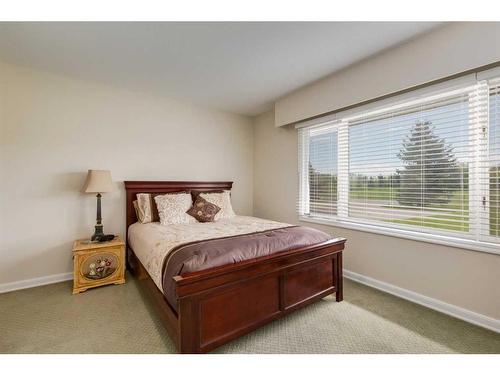 100A-17177 306 Avenue East, Rural Foothills County, AB - Indoor Photo Showing Bedroom