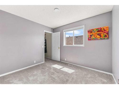 101 Bridlecreek Park Sw, Calgary, AB - Indoor Photo Showing Other Room