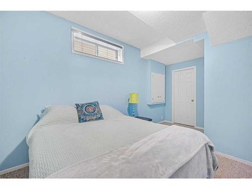 101 Bridlecreek Park Sw, Calgary, AB - Indoor Photo Showing Bedroom