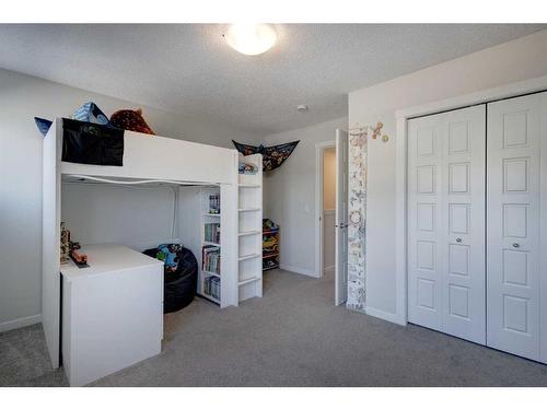 411 Cranbrook Square Se, Calgary, AB - Indoor Photo Showing Bedroom