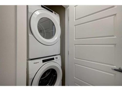 411 Cranbrook Square Se, Calgary, AB - Indoor Photo Showing Laundry Room