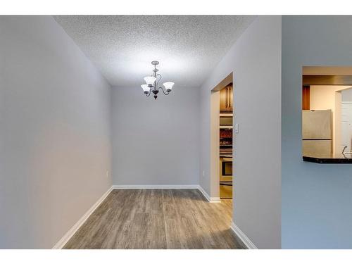 108-790 Kingsmere Crescent Sw, Calgary, AB - Indoor Photo Showing Other Room