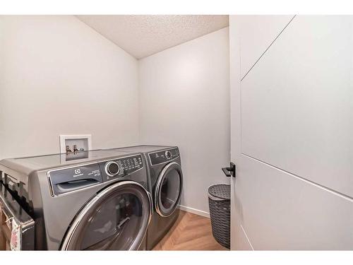 1442 148 Avenue Nw, Calgary, AB - Indoor Photo Showing Laundry Room