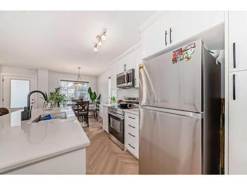 1442 148 Avenue Nw, Calgary, AB - Indoor Photo Showing Kitchen With Upgraded Kitchen