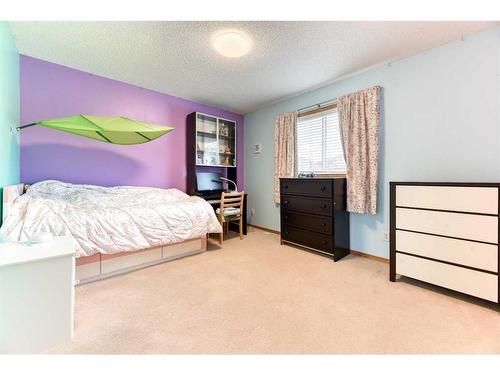 224 Arbour Stone Rise Nw, Calgary, AB - Indoor Photo Showing Bedroom