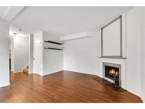 74-5520 1 Avenue Se, Calgary, AB - Indoor With Fireplace