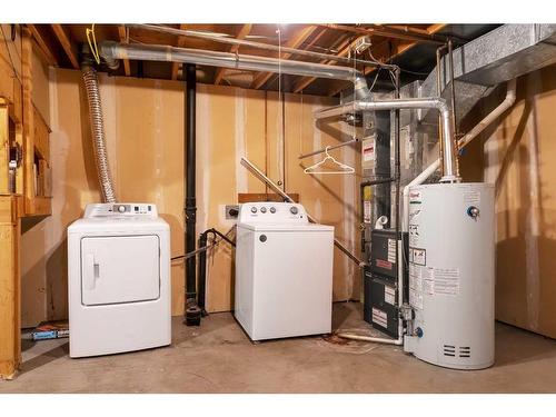 74-5520 1 Avenue Se, Calgary, AB - Indoor Photo Showing Laundry Room