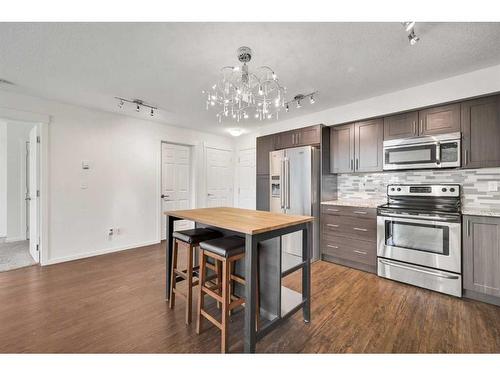 1307-99 Copperstone Park Se, Calgary, AB - Indoor Photo Showing Kitchen With Stainless Steel Kitchen