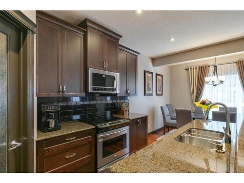 39 Valley Pointe Way Nw, Calgary, AB - Indoor Photo Showing Kitchen With Stainless Steel Kitchen With Double Sink