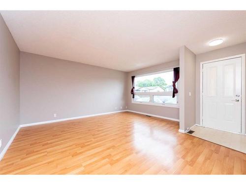 24 Whitaker Close Ne, Calgary, AB - Indoor Photo Showing Other Room