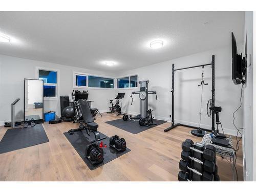 44 Spring Valley Lane Sw, Calgary, AB - Indoor Photo Showing Gym Room