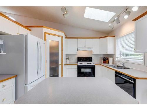 1306 Shannon Avenue Sw, Calgary, AB - Indoor Photo Showing Kitchen With Double Sink