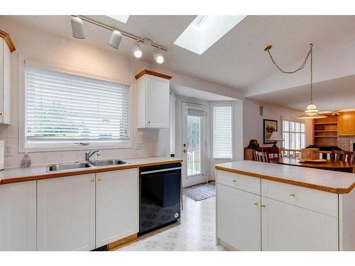 1306 Shannon Avenue Sw, Calgary, AB - Indoor Photo Showing Kitchen With Double Sink