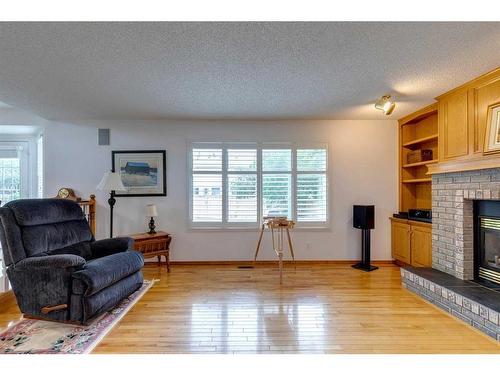 1306 Shannon Avenue Sw, Calgary, AB - Indoor Photo Showing Living Room With Fireplace