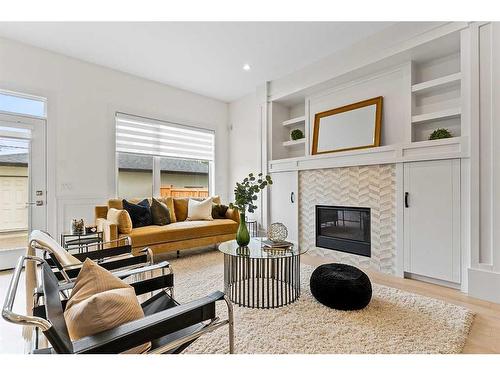 828 23 Avenue Nw, Calgary, AB - Indoor Photo Showing Living Room With Fireplace