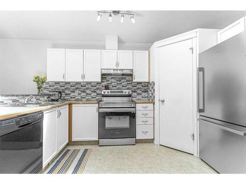 104 Prestwick Avenue Se, Calgary, AB - Indoor Photo Showing Kitchen With Upgraded Kitchen