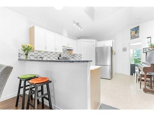 104 Prestwick Avenue Se, Calgary, AB - Indoor Photo Showing Kitchen With Upgraded Kitchen