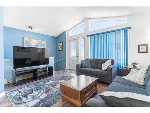 104 Prestwick Avenue Se, Calgary, AB - Indoor Photo Showing Living Room