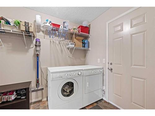 100 Tuscany Ridge Crescent Nw, Calgary, AB - Indoor Photo Showing Laundry Room
