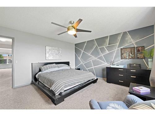 100 Tuscany Ridge Crescent Nw, Calgary, AB - Indoor Photo Showing Bedroom