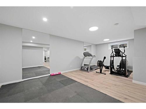 100 Tuscany Ridge Crescent Nw, Calgary, AB - Indoor Photo Showing Gym Room