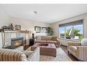 100 Tuscany Ridge Crescent Nw, Calgary, AB  - Indoor Photo Showing Living Room With Fireplace 