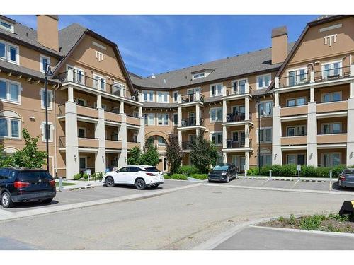 202-30 Mahogany Mews Se, Calgary, AB - Outdoor With Balcony With Facade