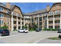 202-30 Mahogany Mews Se, Calgary, AB  - Outdoor With Balcony With Facade 