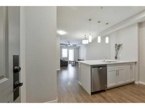 202-30 Mahogany Mews Se, Calgary, AB - Indoor Photo Showing Kitchen With Upgraded Kitchen