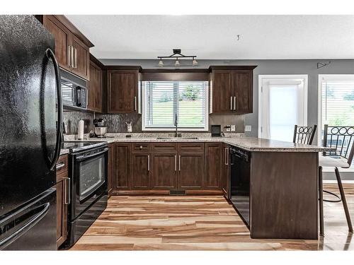 18 Deerfield Green Se, Calgary, AB - Indoor Photo Showing Kitchen