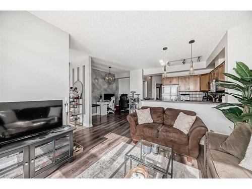 2-145 Rockyledge View Nw, Calgary, AB - Indoor Photo Showing Living Room