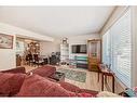 151-405 64 Avenue Ne, Calgary, AB  - Indoor Photo Showing Living Room 