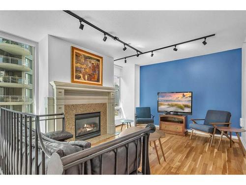 701-837 2 Avenue Sw, Calgary, AB - Indoor With Fireplace