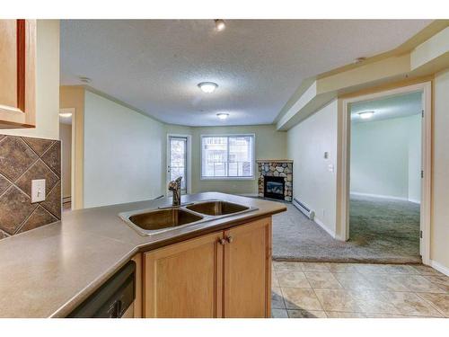 123-369 Rocky Vista Park Nw, Calgary, AB - Indoor Photo Showing Kitchen With Double Sink