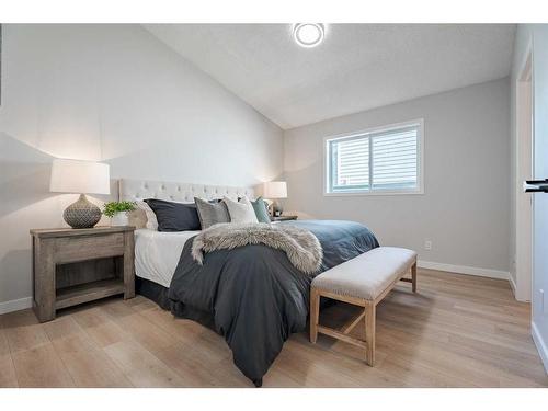 117 Rocky Ridge Landing Nw, Calgary, AB - Indoor Photo Showing Bedroom