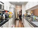 516-55 Arbour Grove Close Nw, Calgary, AB  - Indoor Photo Showing Kitchen With Double Sink 