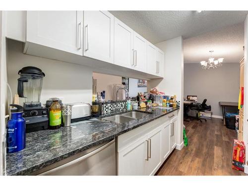 516-55 Arbour Grove Close Nw, Calgary, AB - Indoor Photo Showing Kitchen With Double Sink