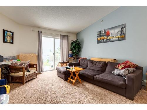516-55 Arbour Grove Close Nw, Calgary, AB - Indoor Photo Showing Living Room