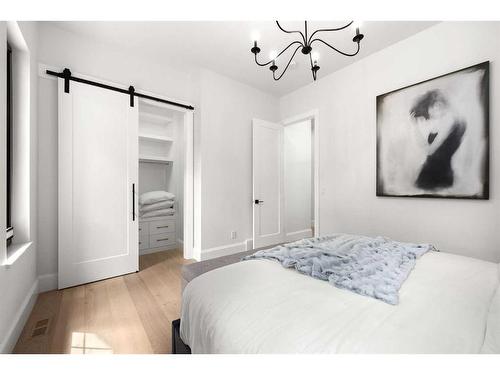 56 Lissington Drive Sw, Calgary, AB - Indoor Photo Showing Bedroom