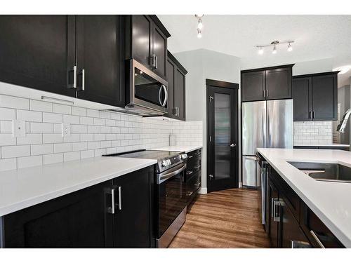 72 Nolanlake Point Nw, Calgary, AB - Indoor Photo Showing Kitchen With Upgraded Kitchen