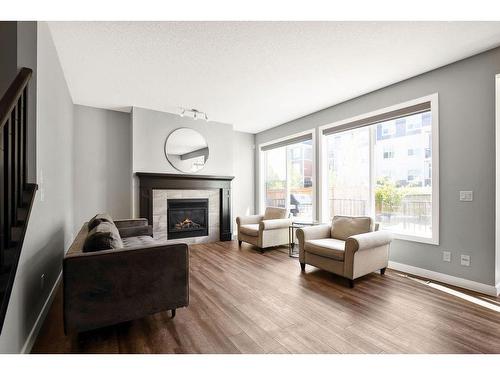 72 Nolanlake Point Nw, Calgary, AB - Indoor Photo Showing Living Room With Fireplace