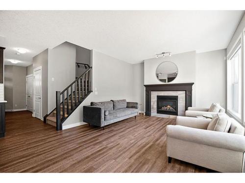 72 Nolanlake Point Nw, Calgary, AB - Indoor Photo Showing Living Room With Fireplace