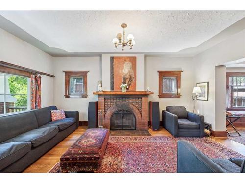 3815 6 Street Sw, Calgary, AB - Indoor Photo Showing Living Room With Fireplace