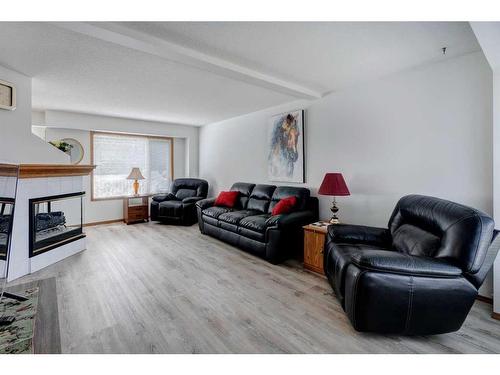 163 Citadel Park Nw, Calgary, AB - Indoor Photo Showing Living Room With Fireplace