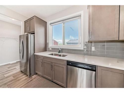 168 Livingston View Ne, Calgary, AB - Indoor Photo Showing Kitchen With Stainless Steel Kitchen With Double Sink