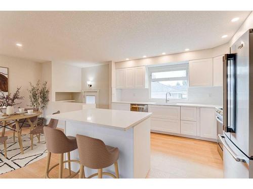 423 Brookmere Crescent Sw, Calgary, AB - Indoor Photo Showing Kitchen With Upgraded Kitchen