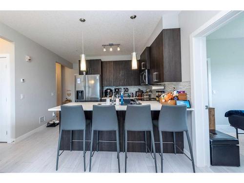 202-24 Sage Hill Terrace Nw, Calgary, AB - Indoor Photo Showing Kitchen With Upgraded Kitchen
