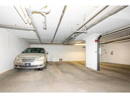 202-24 Sage Hill Terrace Nw, Calgary, AB - Indoor Photo Showing Garage